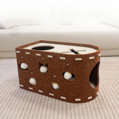 cocon pour chat marron dans salon