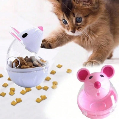 jouet chat chaton jouant avec distributeur blanc rose à cÎté