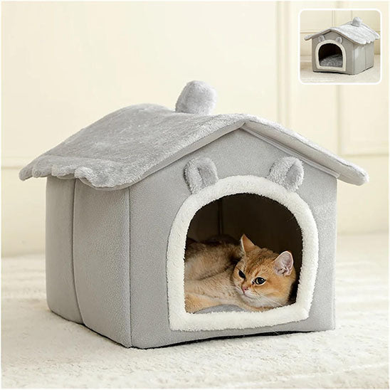 niche à chat grise chaton allongé dedans