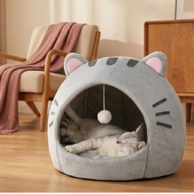 chat endormi paisiblement dans niche a chats