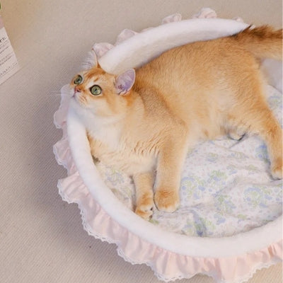 chaton relaxant couffin pour chat rose