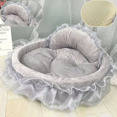 couffin chaton gris métalisé sur parquet