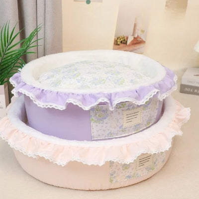 couffin pour chat violet mis sur rose