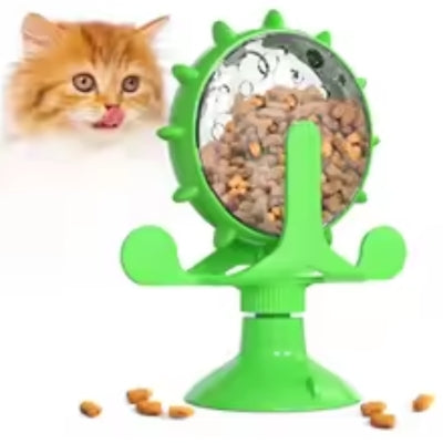 jouet chat interactif vert chaton regardant avec gourmandise  distributeur friandises