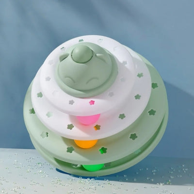 jouet pour chat vert sur côté