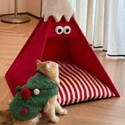 niche chat rouge chat veston vert devant