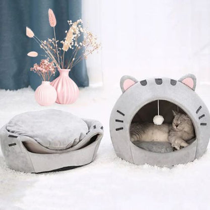 niche pour chat chat dormant dedans