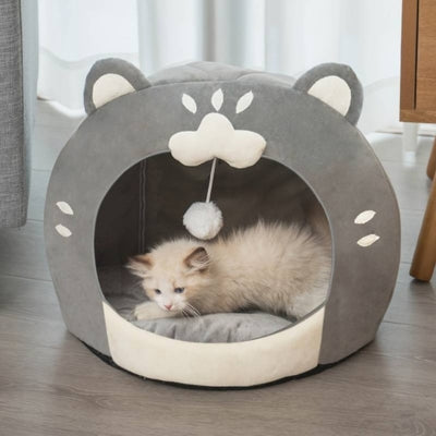 niche pour chaton chaton installé confortablement à l'intérieur