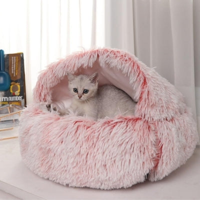 niche pour chaton fuchsia chaton detendu dedans