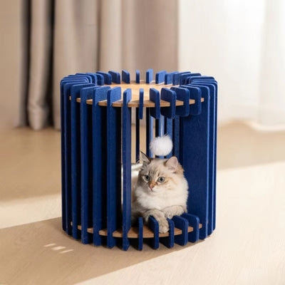 ragdoll detendu dans cocon pour chat tour bleue pétrole