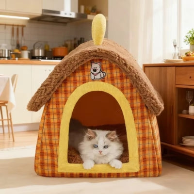 ragdoll detendu dans maison pour chaton ours rétro