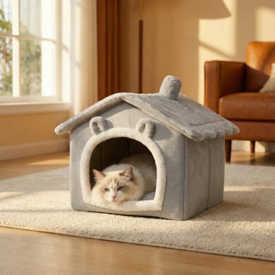 ragdoll detendu dans niche pour chat interieur grise
