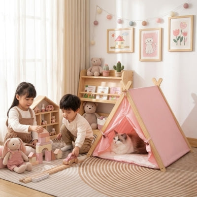 ragdoll relaxant dans tipi pour chat rose enfants jouant à côté